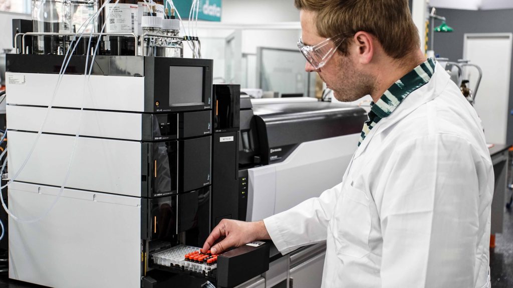 Cannabis testing lab worker